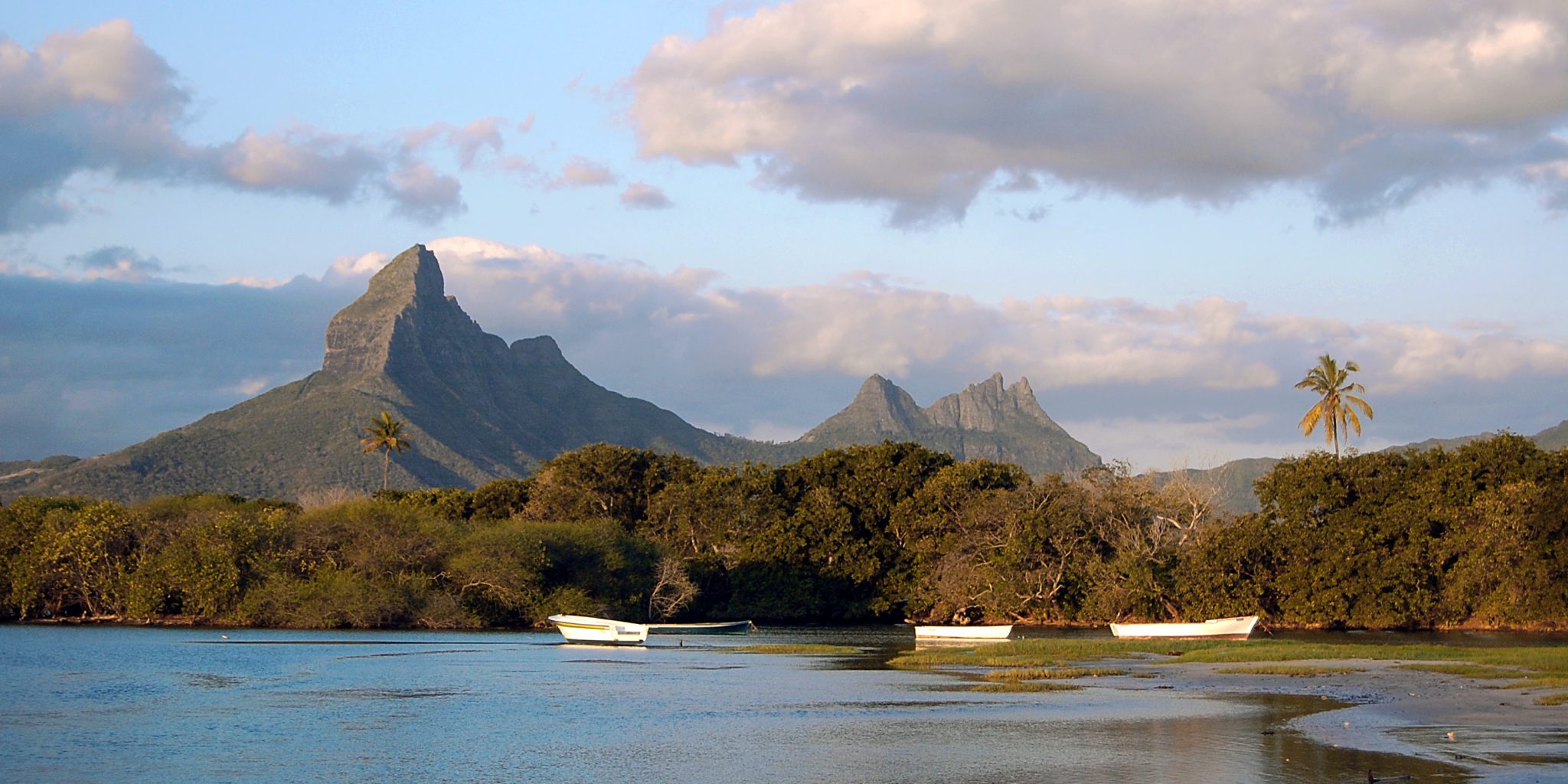 Tamarin Bay Landscape At Sunset With Mountain In Background